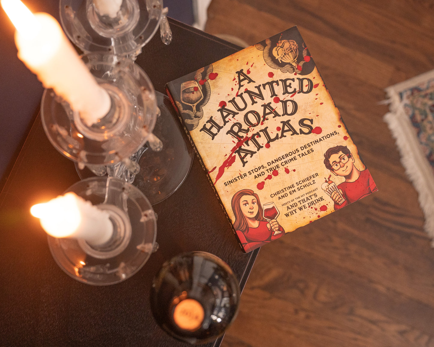 A Haunted Road Atlas: Sinister Stops, Dangerous Destinations, and True Crime Tales by Christine Schiefer, Em Schulz