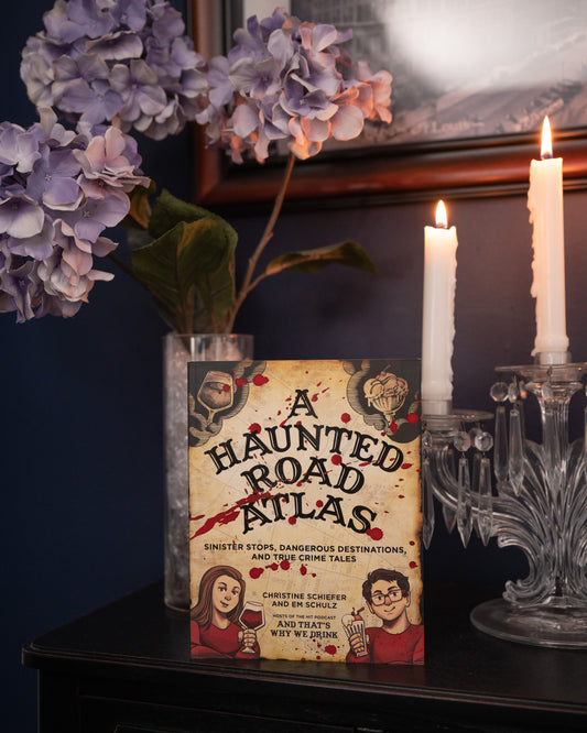 A Haunted Road Atlas: Sinister Stops, Dangerous Destinations, and True Crime Tales by Christine Schiefer, Em Schulz